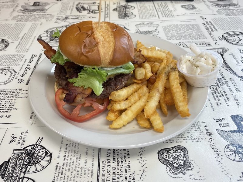 The King of the Road burger with fries and coleslaw on a Horne's placemat
